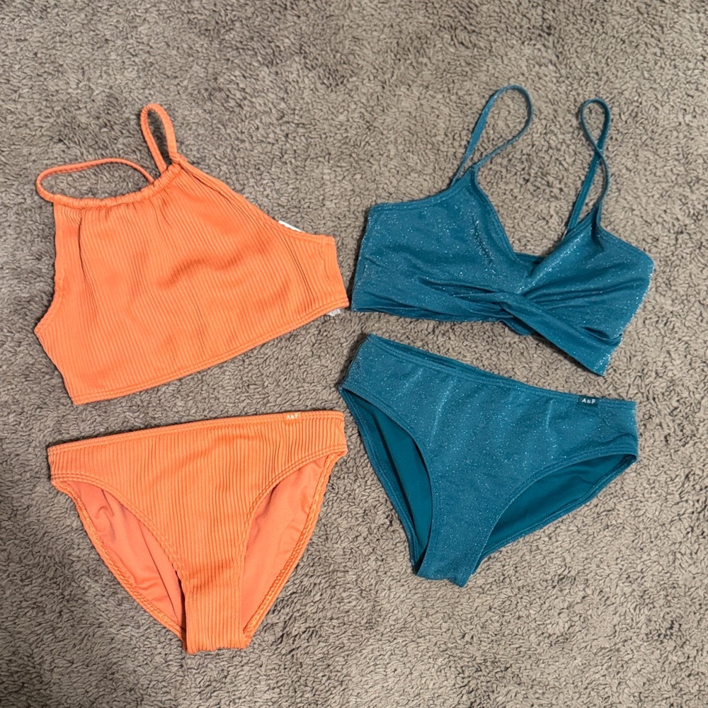 Two Abercrombie Kids Bikinis. One Orange and one Teal Swim Bikinis